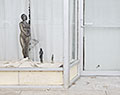 Statues in store window. Council Grove, Kansas